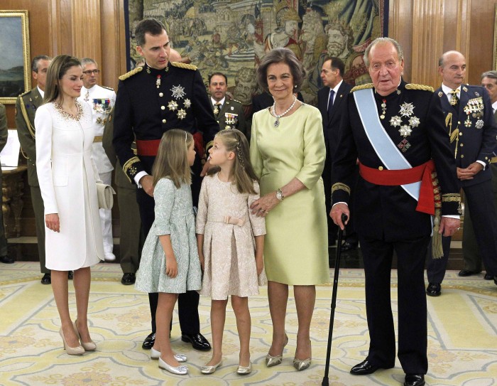 Spain's King Juan Carlos and Queen Sofia, new King Felipe VI, her wife Queen Letizia, their daughters Princess Leonor and Princess Sofia pose after the Sash of Captain-General ceremony at La Zarzuela Palace in Madrid