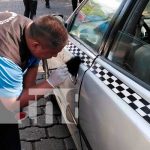 Investigación por robo de vehículo taxi en Managua