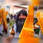 “Jesucristo” se hace viral por cargar una cruz con cajillas de cerveza
