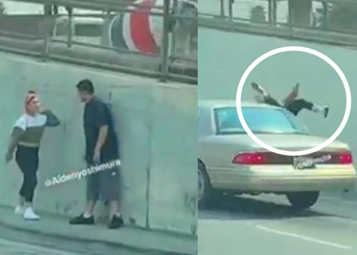Mujer se arroja a los carros en una pelea con su marido