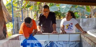 Alternativa para salir adelante: Familias de Managua crían tilapias en sus patios
