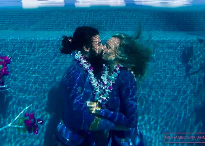 Pareja rompe récord Guinness del beso más largo bajo el agua 