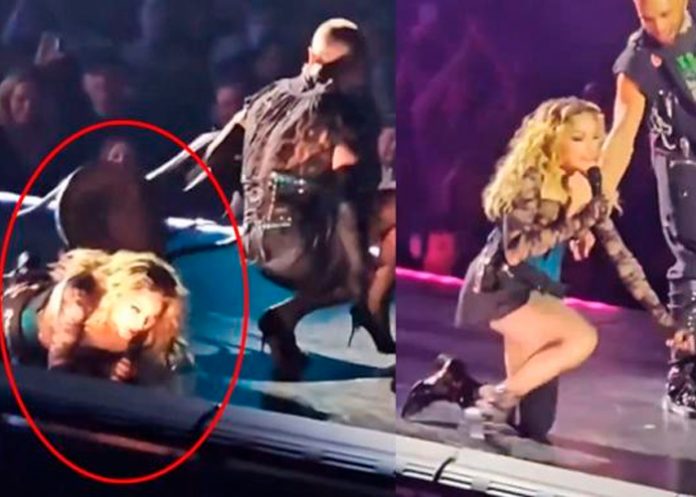 Madonna sufre caída arriba del escenario