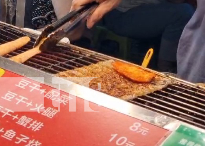 Sabores exóticos y delicias callejeras: El festín gastronómico de Yichang, China